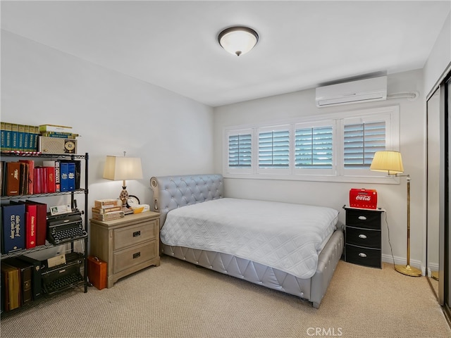 bedroom with light carpet and a wall mounted air conditioner