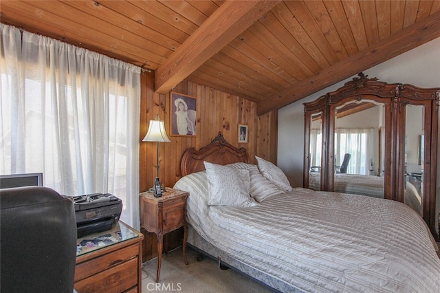 bedroom with wooden ceiling, wood walls, carpet flooring, and beam ceiling