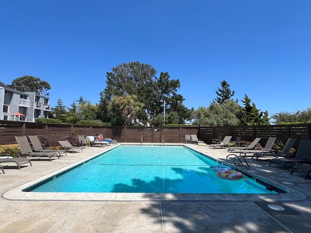 view of pool featuring a patio area