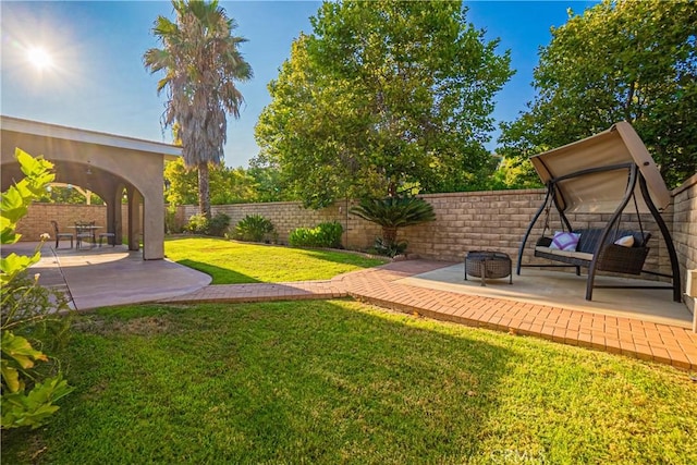 view of yard featuring a fenced backyard and a patio