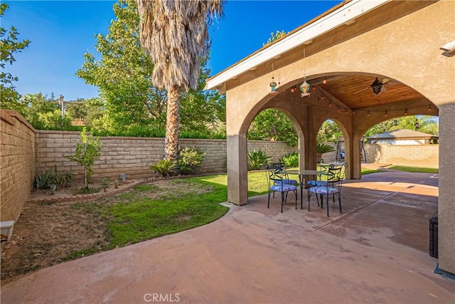 view of patio featuring a fenced backyard