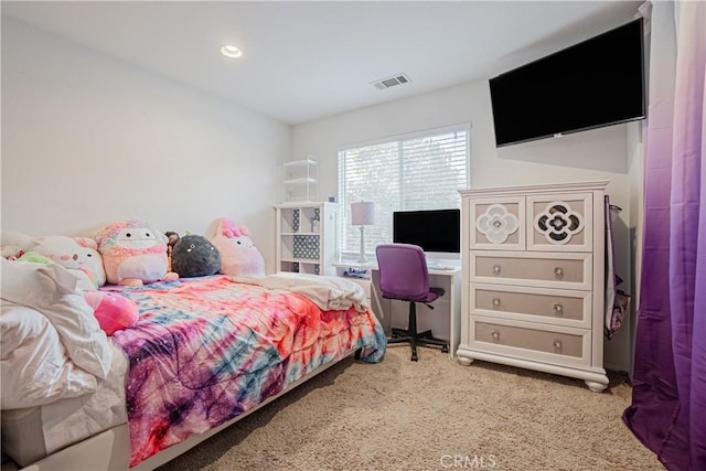 carpeted bedroom with visible vents and recessed lighting