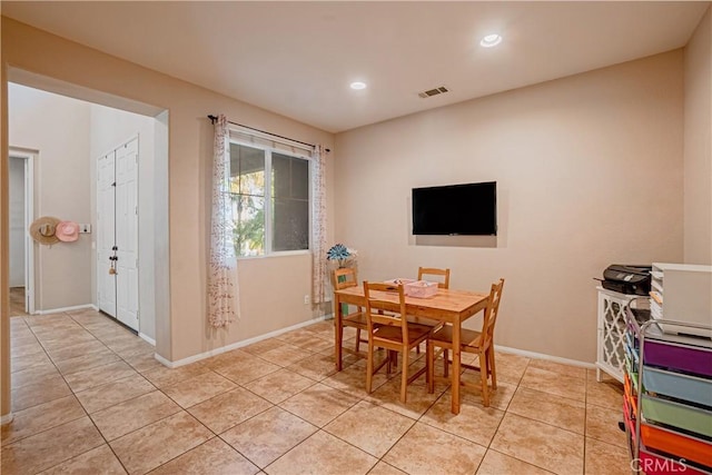 dining room featuring light tile patterned floors, baseboards, visible vents, and recessed lighting