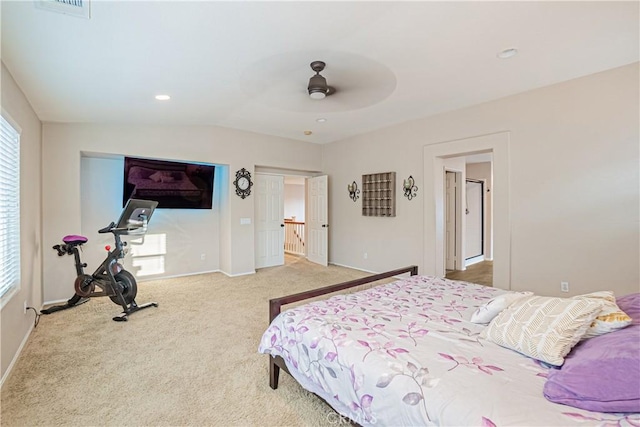 bedroom featuring visible vents, baseboards, ceiling fan, vaulted ceiling, and carpet floors