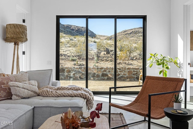 living room featuring a mountain view