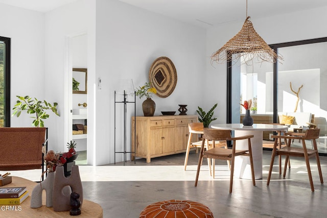 dining area with concrete floors