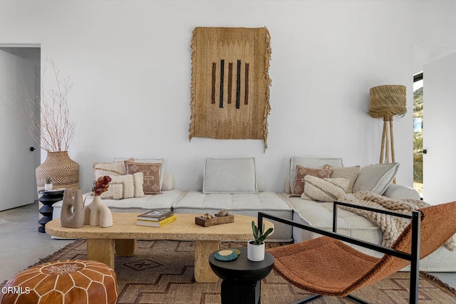 living room featuring concrete floors