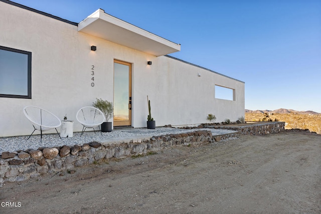 exterior space featuring a mountain view