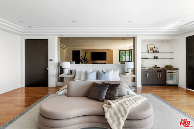 bedroom featuring hardwood / wood-style floors and beverage cooler