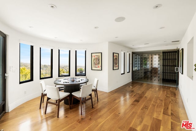 dining room featuring light hardwood / wood-style floors