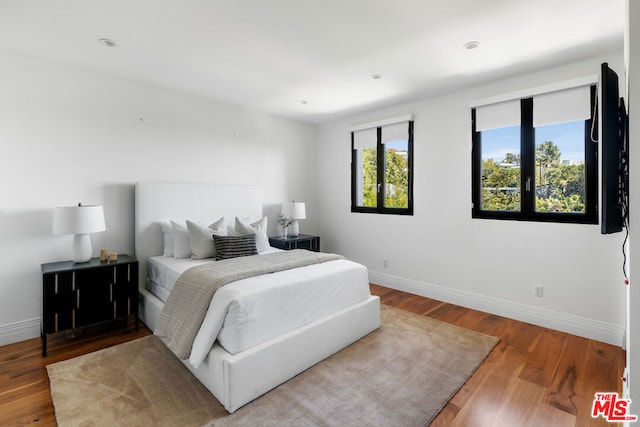 bedroom featuring hardwood / wood-style floors