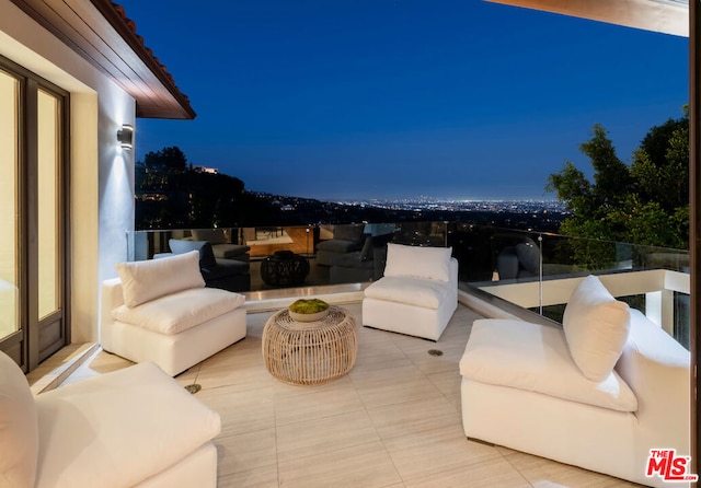 view of patio / terrace with a balcony