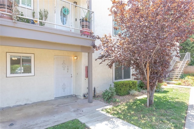 doorway to property with a balcony