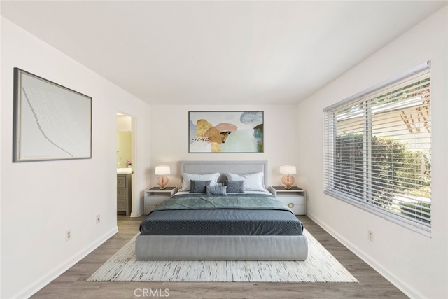 35104 Mesa Grande Dr, Calimesa, CA 92320 - bedroom with baseboards, wood finished floors, and ensuite bathroom