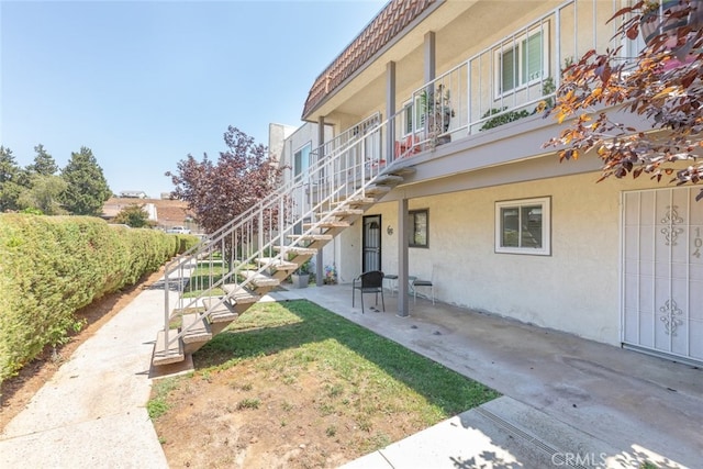 35104 Mesa Grande Dr, Calimesa, CA 92320 - exterior space featuring stairs and a patio