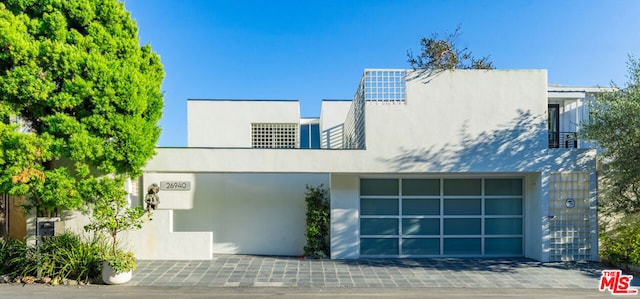 modern home featuring a garage