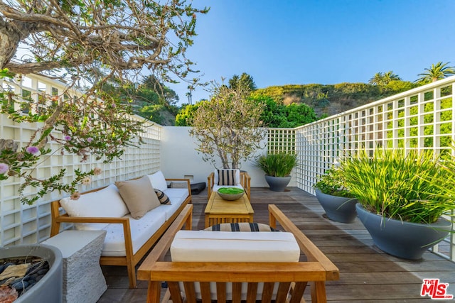 view of patio / terrace featuring outdoor lounge area and a deck