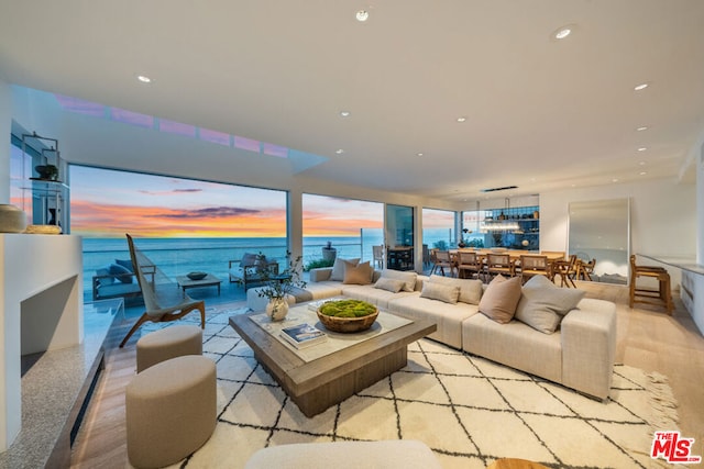 living room featuring a water view