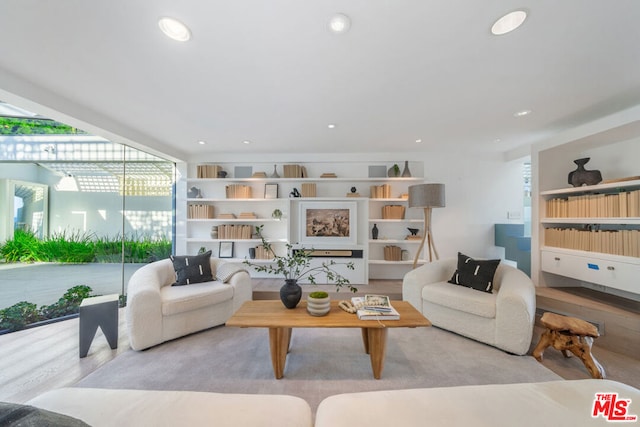 living room with light hardwood / wood-style floors