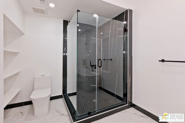 bathroom with an enclosed shower and toilet