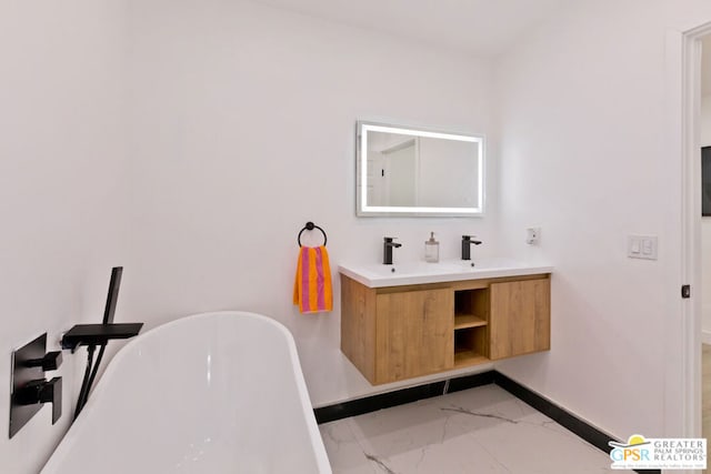 bathroom with vanity and a bathing tub