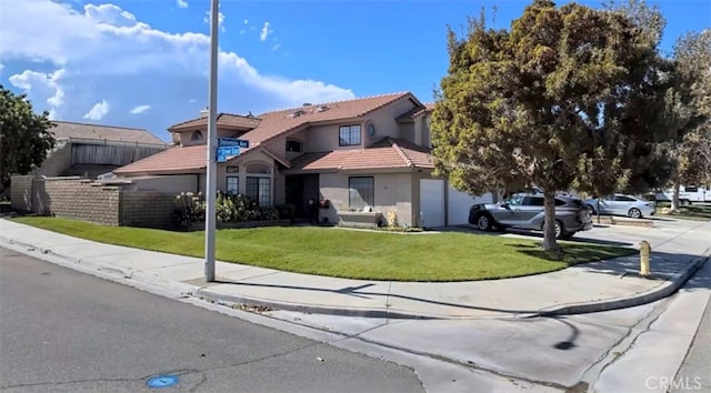 front of property featuring a front lawn