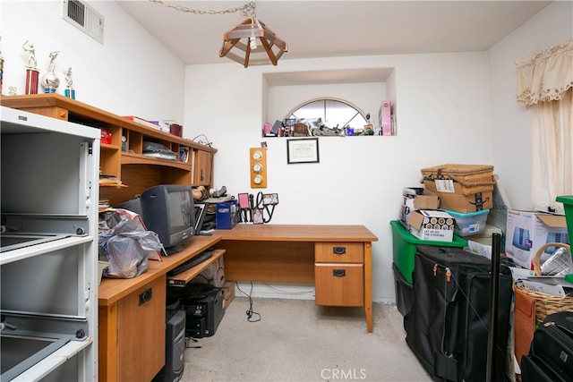 home office with light colored carpet