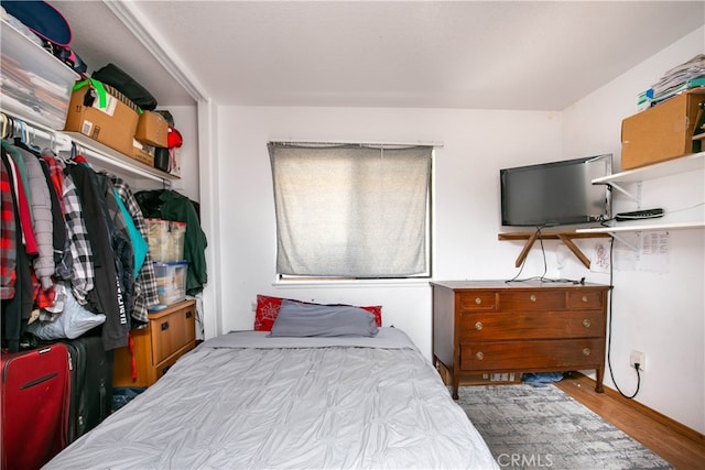 bedroom featuring light hardwood / wood-style flooring