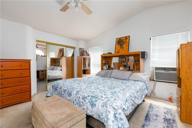 carpeted bedroom with ceiling fan, cooling unit, a closet, and lofted ceiling