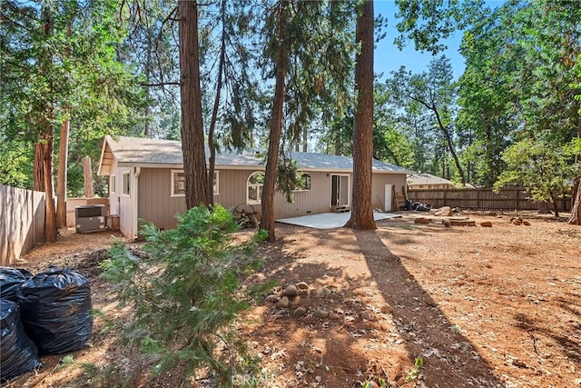 back of property featuring a patio and central air condition unit