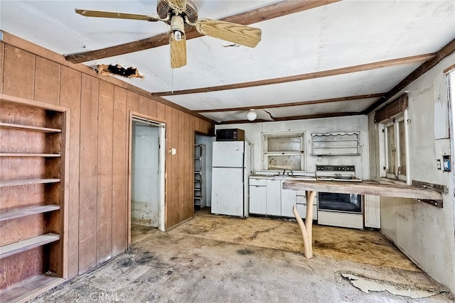 kitchen featuring white appliances, ceiling fan, and wooden walls