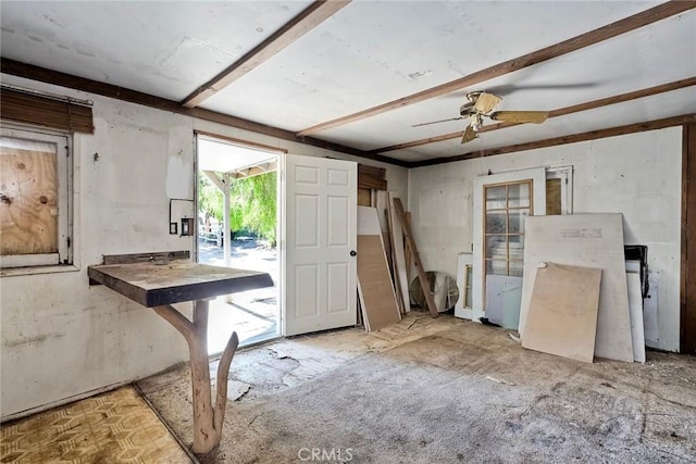 interior space with ceiling fan