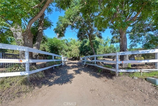 view of gate featuring fence