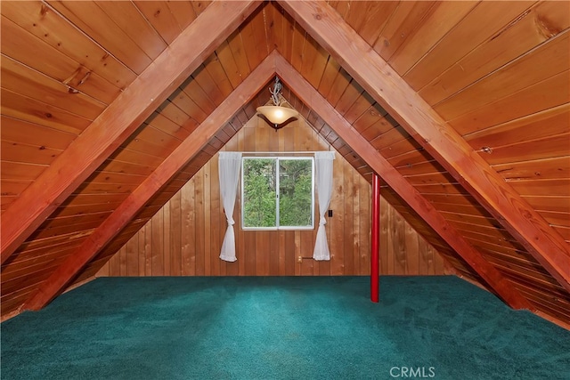 additional living space featuring carpet floors, wood ceiling, and wood walls