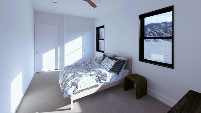 bedroom featuring ceiling fan and carpet flooring