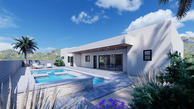 view of swimming pool featuring an in ground hot tub, a mountain view, and a patio