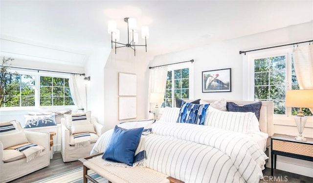 514 Emerald Dr, Lake Arrowhead, CA 92352 - bedroom featuring a chandelier and wood finished floors
