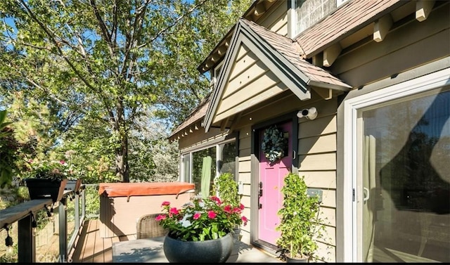514 Emerald Dr, Lake Arrowhead, CA 92352 - view of side of property featuring a hot tub and a wooden deck