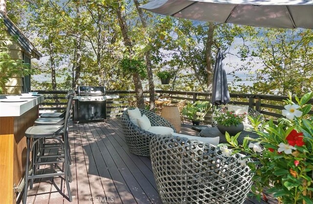 514 Emerald Dr, Lake Arrowhead, CA 92352 - wooden deck with a grill