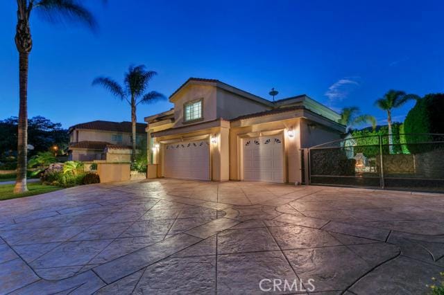 view of front of property with a garage