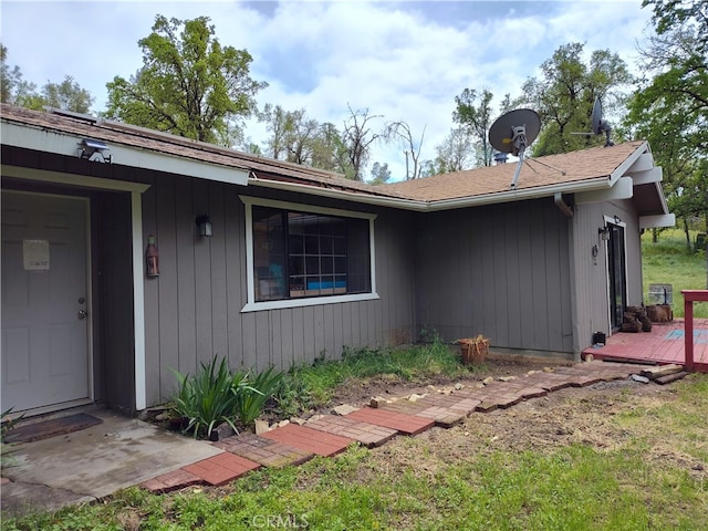 exterior space featuring a wooden deck