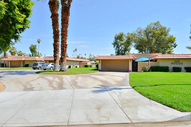 ranch-style home with a front lawn