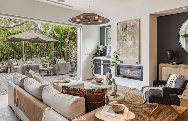 living room with light hardwood / wood-style floors