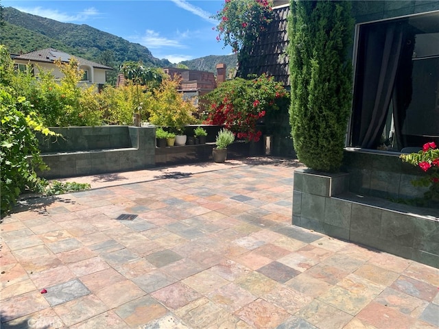 view of patio featuring a mountain view