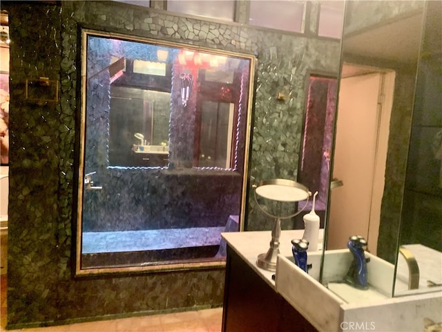 bathroom with vanity and tile patterned flooring