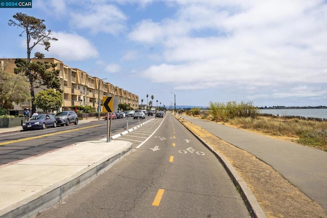 view of road featuring a water view