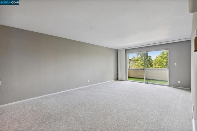 spare room with carpet flooring