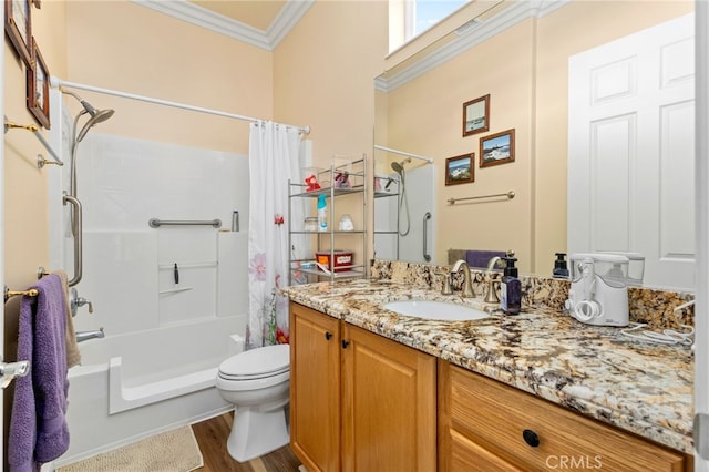 full bathroom with vanity, ornamental molding, hardwood / wood-style flooring, toilet, and shower / tub combo with curtain