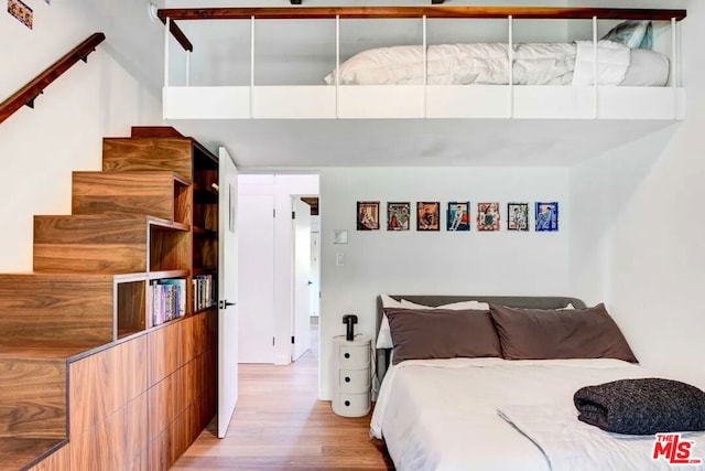 bedroom featuring light hardwood / wood-style flooring