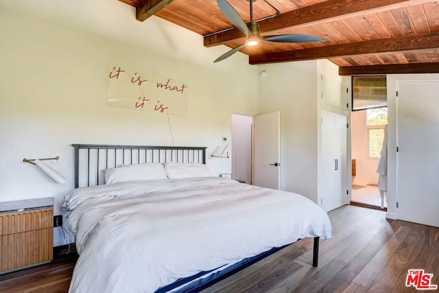 bedroom featuring ensuite bath, ceiling fan, radiator heating unit, dark hardwood / wood-style flooring, and wood ceiling